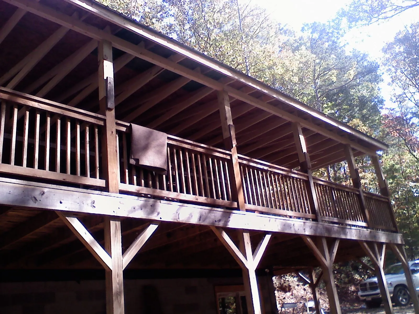 Timber framing under a new elevated porch and deck — Roof Leak Repair in Biddeford Pool by Roofing Brothers